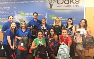 Oaks team with backpacks