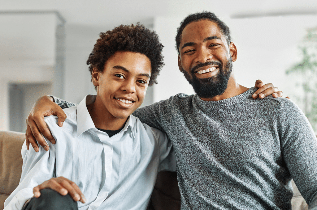 Father and son in home