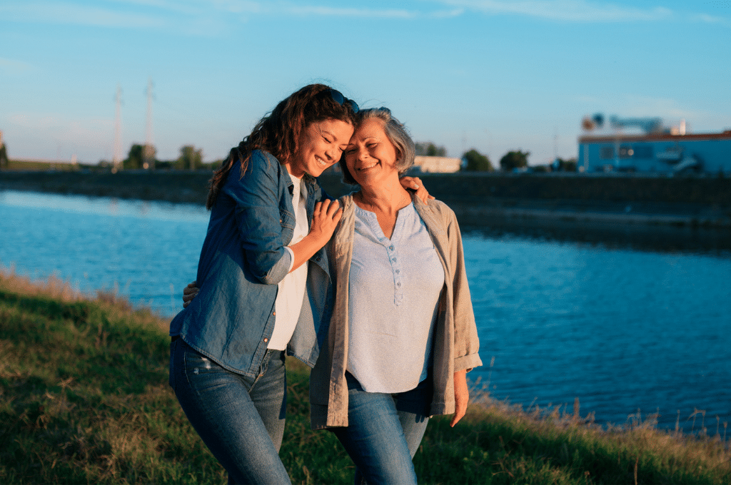 Daughter supporting mother